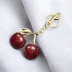 ميدالية مفاتيح الكريزة الأنيقة – مدالية مفاتيح بناتي بتصميم كرز لامع من الأكريليك والمعدن - 12*7 سم – إكسسوار حقيبة ومفاتيح