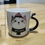 ⁦مج بورسلين 370 مللي بتصميم قط كيوت – كوب قهوة وشاي أنيق للمكتب والمنزل⁩ - الصورة ⁦3⁩