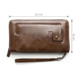 ⁦محفظة يد جلد بني رجالي – حجم 22×12 سم – تصميم أنيق بسحاب وحزام يد⁩ - الصورة ⁦3⁩