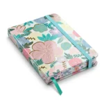 ⁦نوت بوك ميني هارد كوفر تصميم زهور ملونة صغير الحجم عملي وأنيق مقاس 10.5×7.5 سم⁩ - الصورة ⁦3⁩