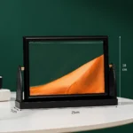 ⁦لوحة رملية متحركة ثلاثية الأبعاد بإطار أسود مقاس 25×18 سم – ديكور مكتبي مهدئ للاسترخاء وتشكيل مناظر رملية فريدة⁩ - الصورة ⁦2⁩