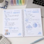 ⁦نوت بوك الإحصاء Statistics A4 سلك 100 ورقة مسطرة بغلاف جلوسي شفاف⁩ - الصورة ⁦3⁩