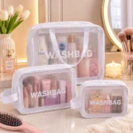 ⁦طقم شنط تنظيم للمكياج والسفر 3 قطع شفافة بمقاسات مختلفة – أبيض WASHBAG⁩ - الصورة ⁦3⁩