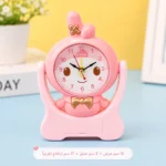 ⁦منبه أطفال كرتوني 4 تصميمات بقاعدة ودرج صغير – ساعة مكتب منبه مقاس 15×5×17 سم⁩ - الصورة ⁦4⁩