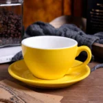 فنجان بورسلين أصفر مع طبق - الأبعاد 10*8*6 سم