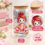 ⁦كوب زجاج بغطاء خشبي وشاليموه 550 مل بتصميم فتاة كرتونية تذاكر – 16 × 7 سم⁩ - الصورة ⁦3⁩